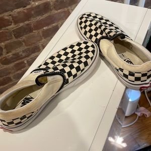 Classic Van’s black and white checkered kid’s shoes